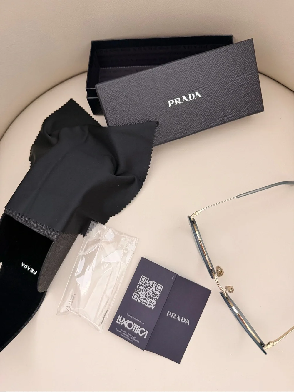 Prada 100% Round Sunglasses in Light Grey with Gold Trim
